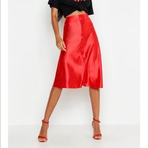 Red satin midi skirt